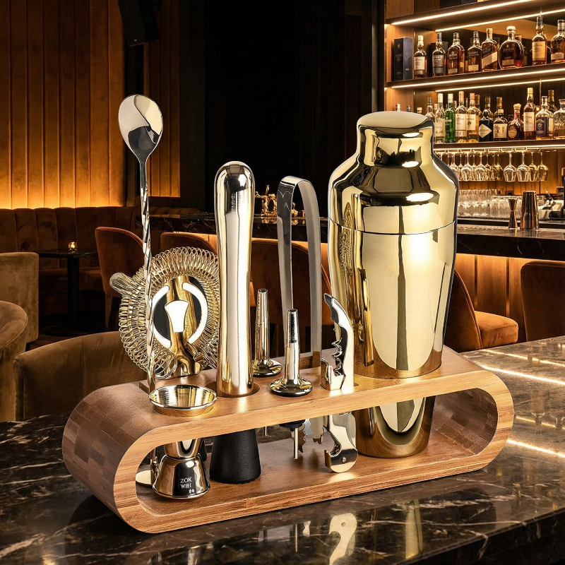 Set of cocktail-making tools on a wooden stand with a bar setting in the background