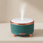 Teal and rose gold humidifier on a beige background