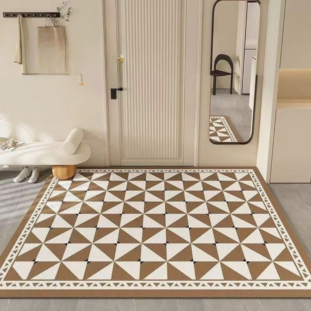 Geometric patterned rug on a floor with a mirror and door in the background.