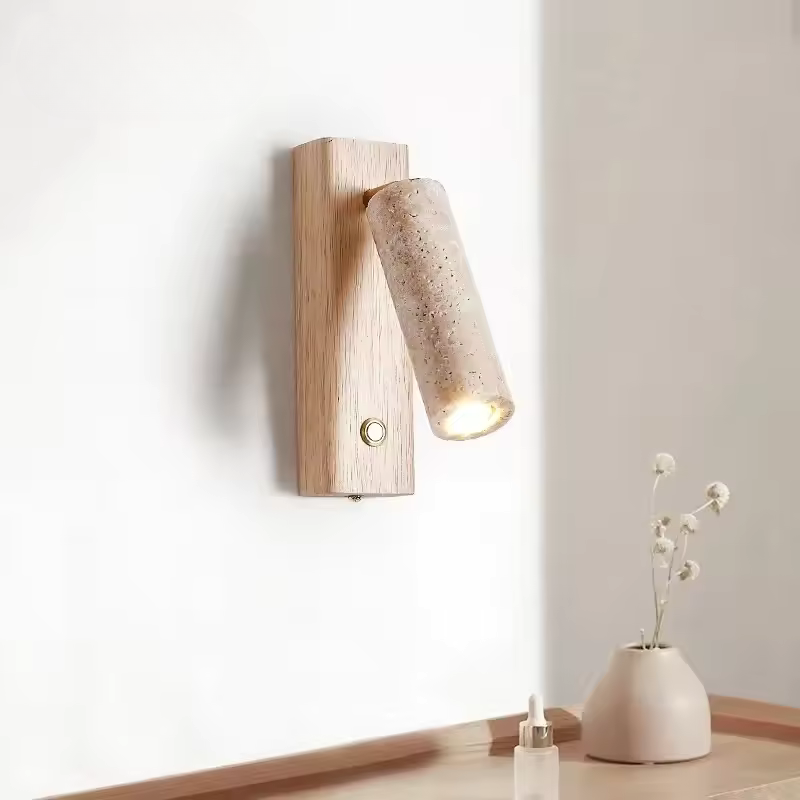 Wooden wall sconce with a light bulb on a neutral background