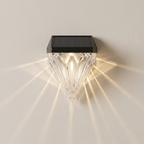 Solar wall light fixture on a plain wall