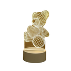 Teddy bear-shaped night light on a white background