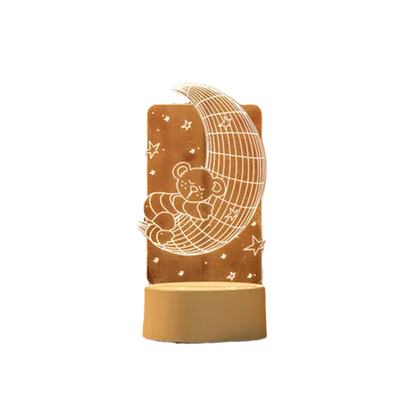 Decorative night light with a moon and teddy bear design on a white background
