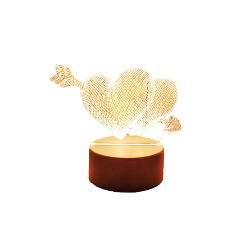 Decorative lamp with heart and arrow design on a white background