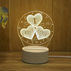 Decorative night light with 'I LOVE YOU' text on a wooden surface