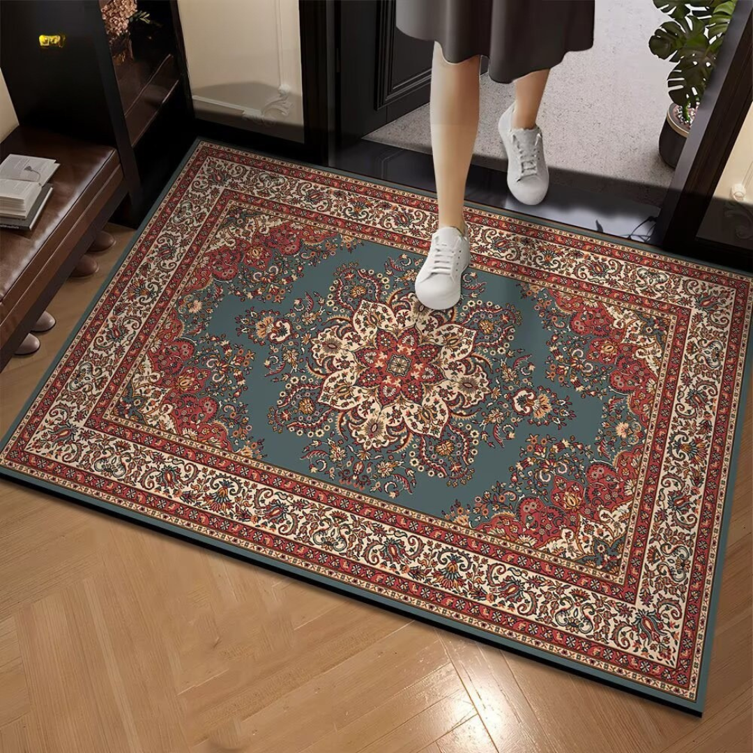 Decorative rug with intricate patterns on a wooden floor, person stepping onto it.