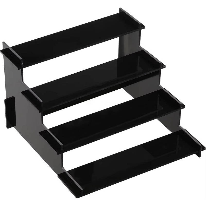 Black metal step stool with four tiers on a white background