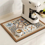 Decorative kitchen mat with geometric pattern next to a coffee machine and cups.