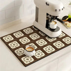 Kitchen mat with coffee cups and a coffee machine on a tiled floor