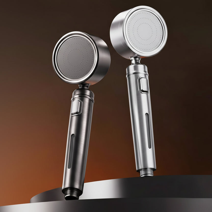 Two metallic handheld shower heads on a gradient brown background