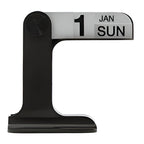 A modern black and white calendar block displaying '1 JAN SUN' on a clean white background.