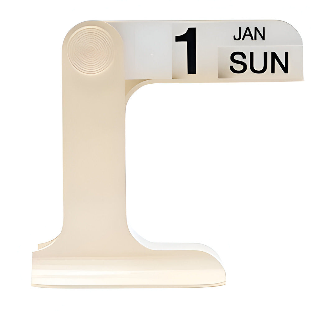 A modern, minimalist L-shaped desk calendar in a warm cream or off-white color, shown on a solid white background. The calendar is displaying the date '1 JAN SUN'.