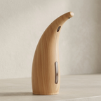 Wooden bottle opener on a neutral background