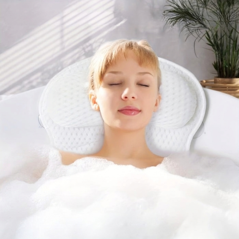 Woman lying on a white pillow with a blurred background