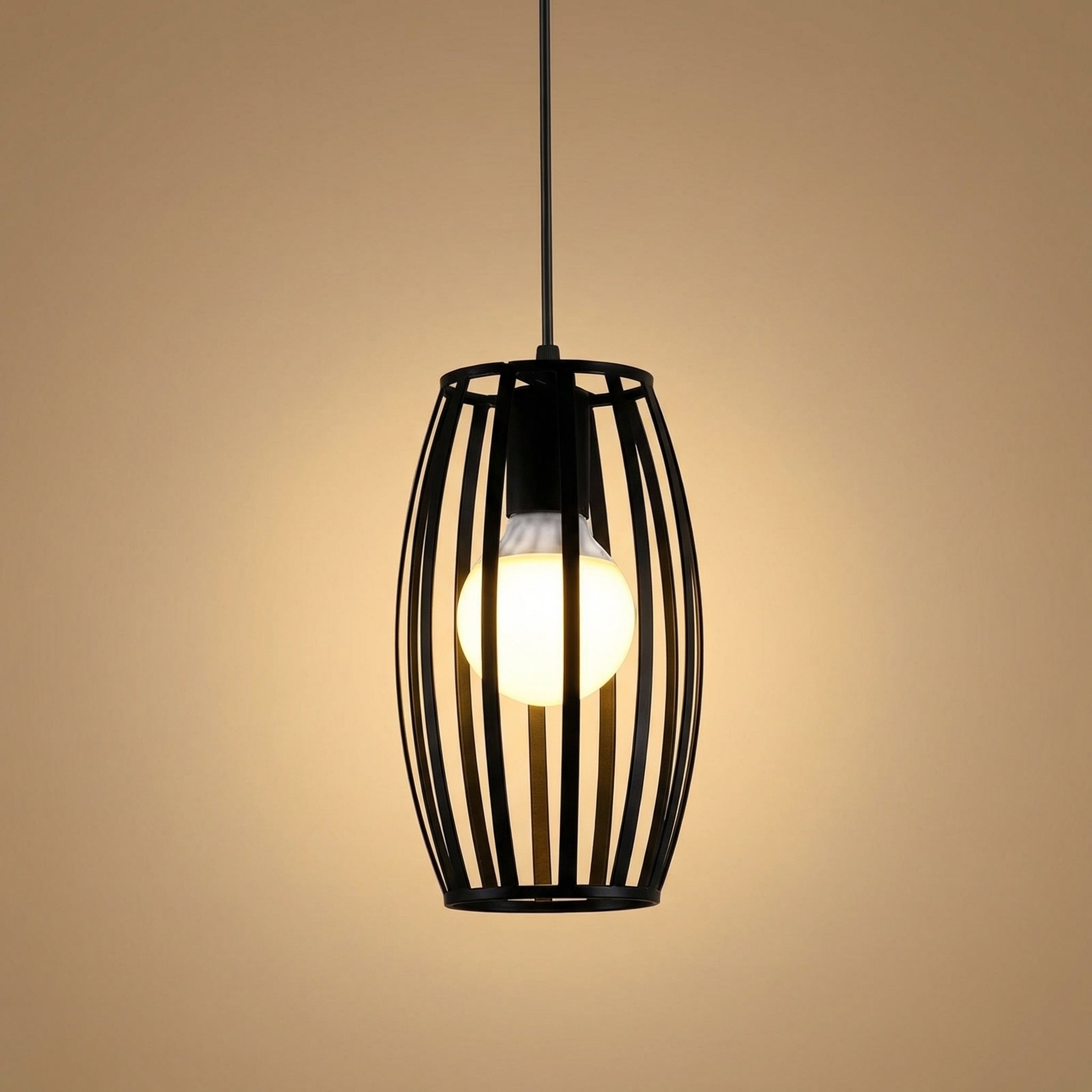 Black pendant light with a glowing bulb on a beige background