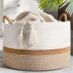 Woven basket with tassels on a light surface