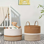 Two woven baskets in a nursery setting with a teddy bear and baby blanket.