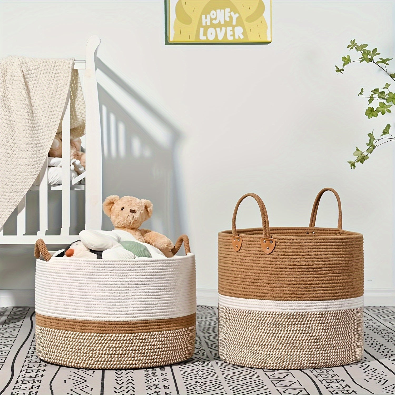 Two woven baskets in a nursery setting with a teddy bear and baby blanket.