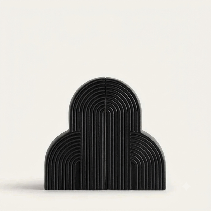 Black arch-shaped object on a white background
