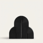 Black arch-shaped object on a white background