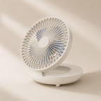 White portable fan on a beige background