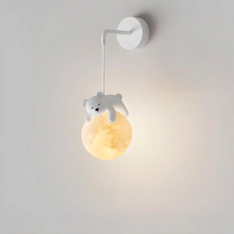 Wall lamp with a bear-shaped fixture on a plain background