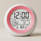 Digital clock with pink and white design on a beige background