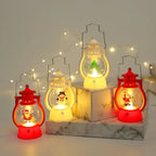 Set of decorative lanterns with Christmas-themed figures on a marble base.