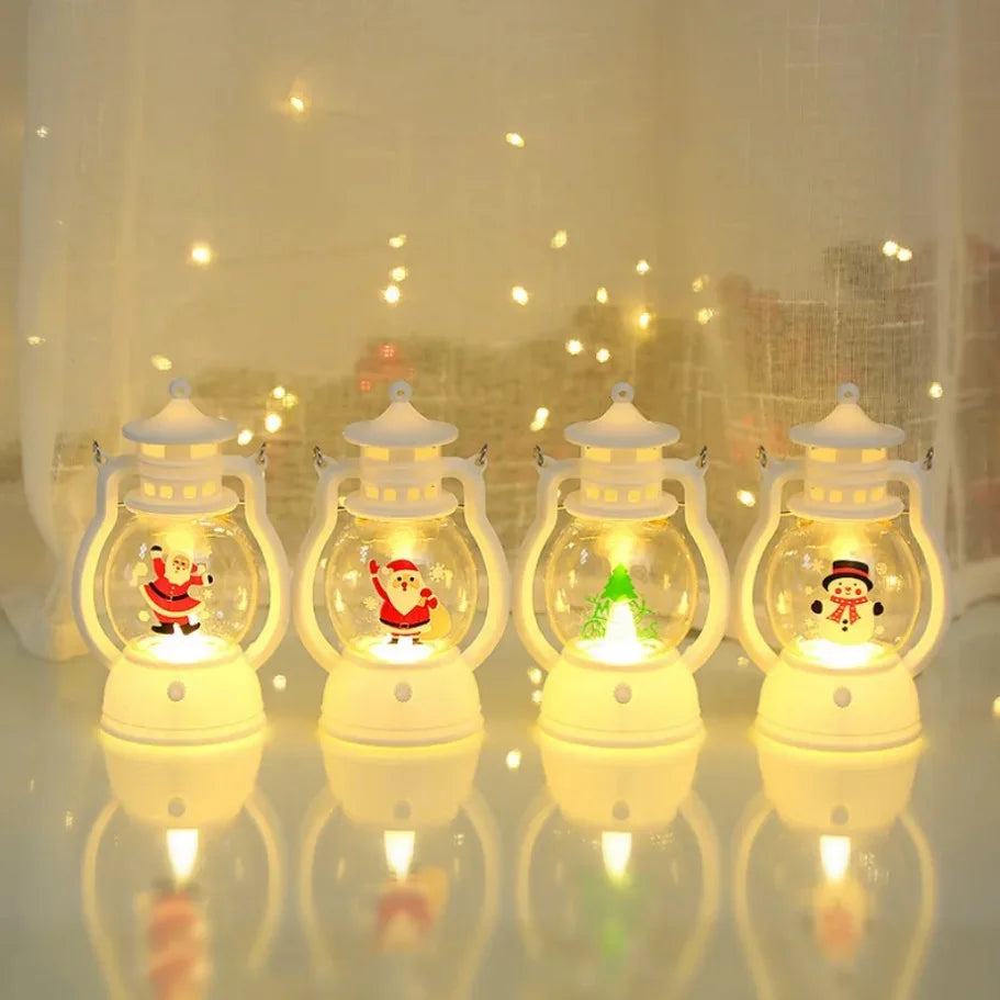 Set of four decorative lanterns with Santa Claus figures on a reflective surface.