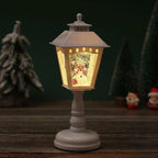 Decorative lantern with a Christmas scene on a wooden surface with a dark background