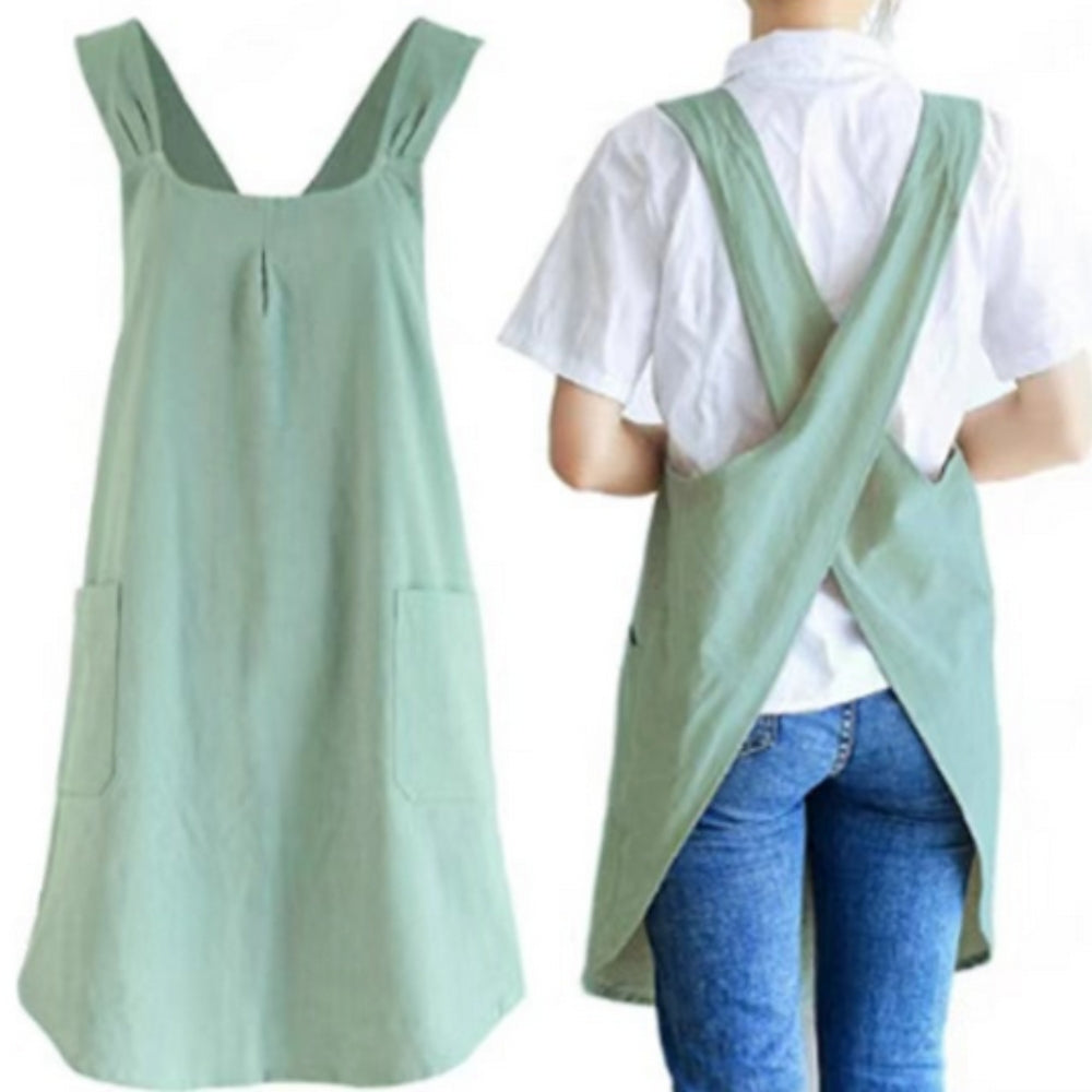 Light green apron worn by a person on a white background