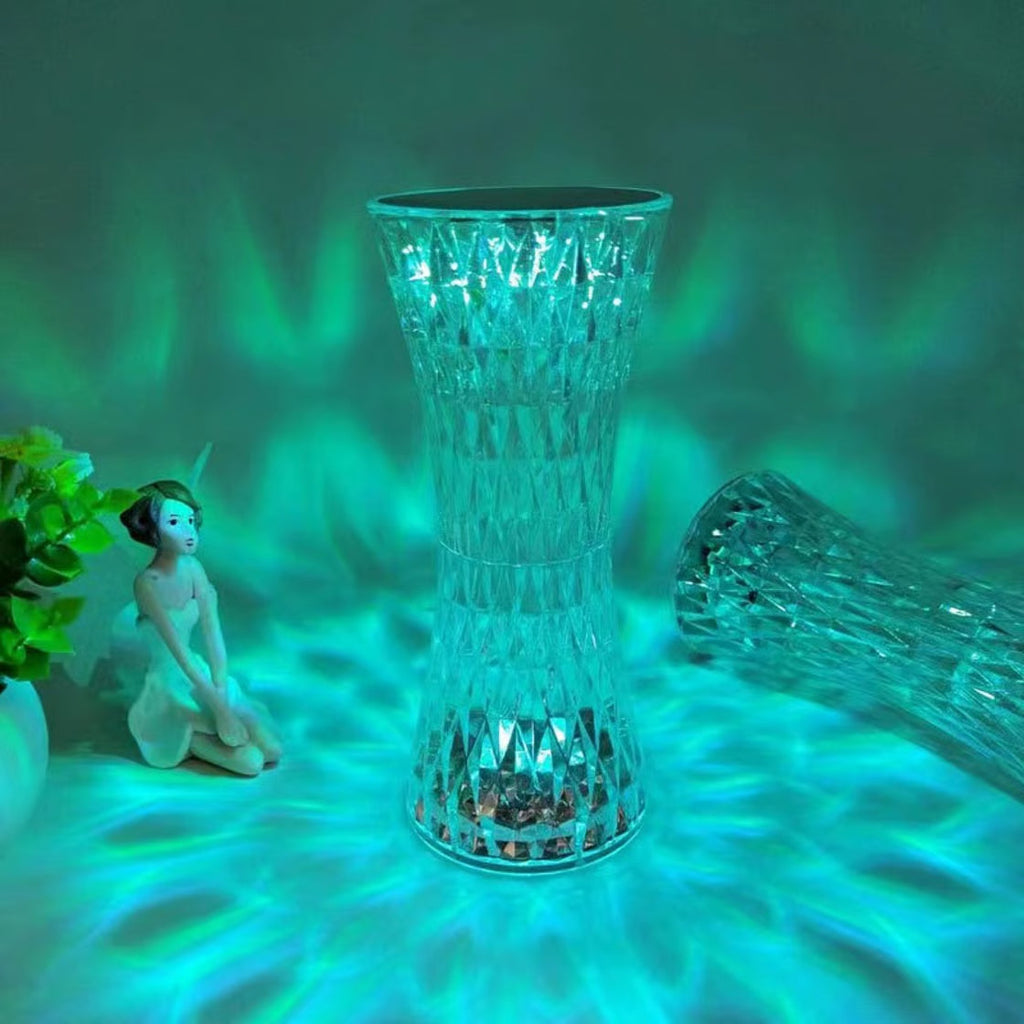Crystal vase with a green glowing effect on a blurred background