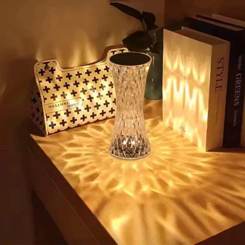 Decorative glass vase on a shelf with warm lighting