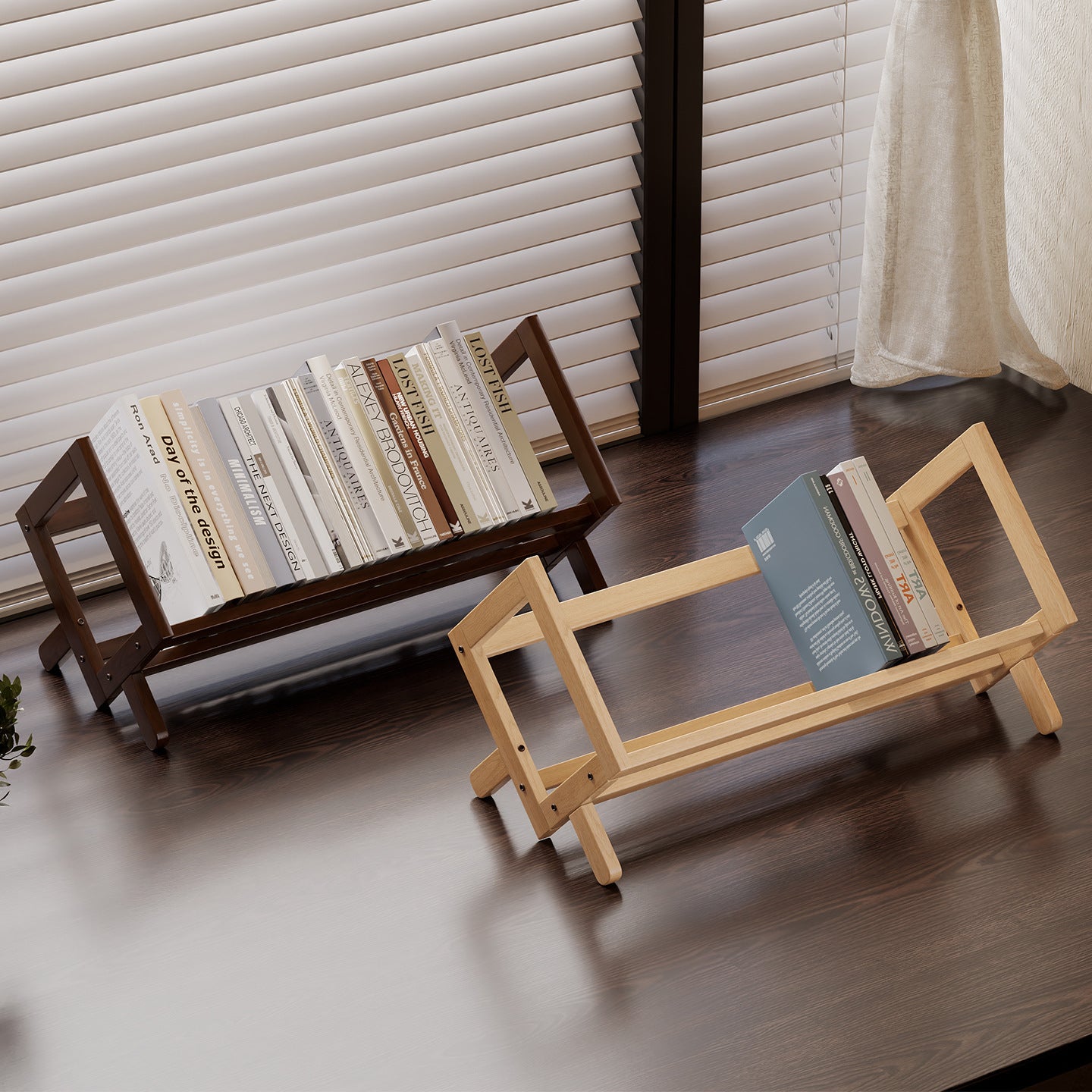 Two wooden book stands with books on a wooden floor.
