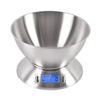 A stainless steel digital kitchen scale with a conical measuring bowl on a round base, featuring a blue LCD display screen and two control knobs labeled in English and Chinese.
