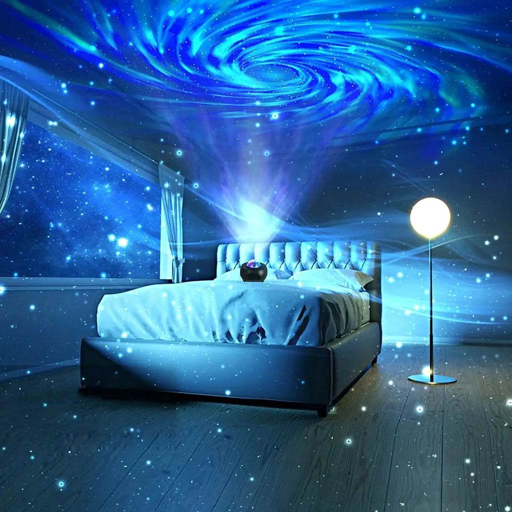A bedroom scene with a bed dressed in white bedding, a floor lamp, and a large blue galaxy projection on the ceiling and walls, with star-like speckles across the room.
