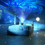 A bedroom scene with a bed dressed in white bedding, a floor lamp, and a large blue galaxy projection on the ceiling and walls, with star-like speckles across the room.