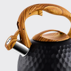 Wooden handle on a black textured surface with a white background