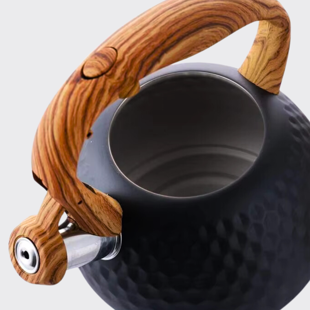Teapot with wooden handle and trim on a light gray background