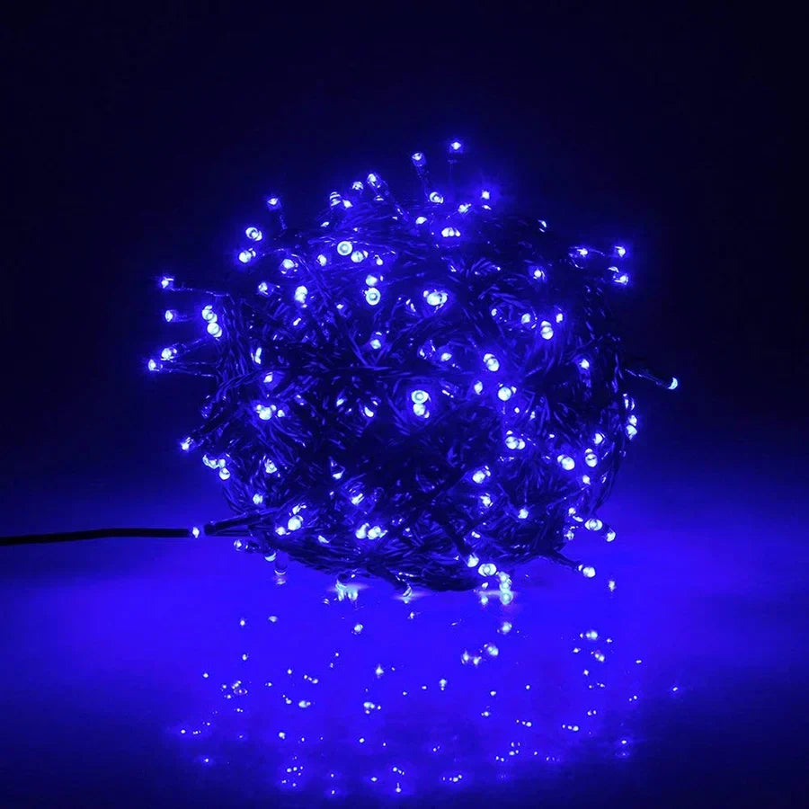 Bunch of blue LED string lights on a dark background