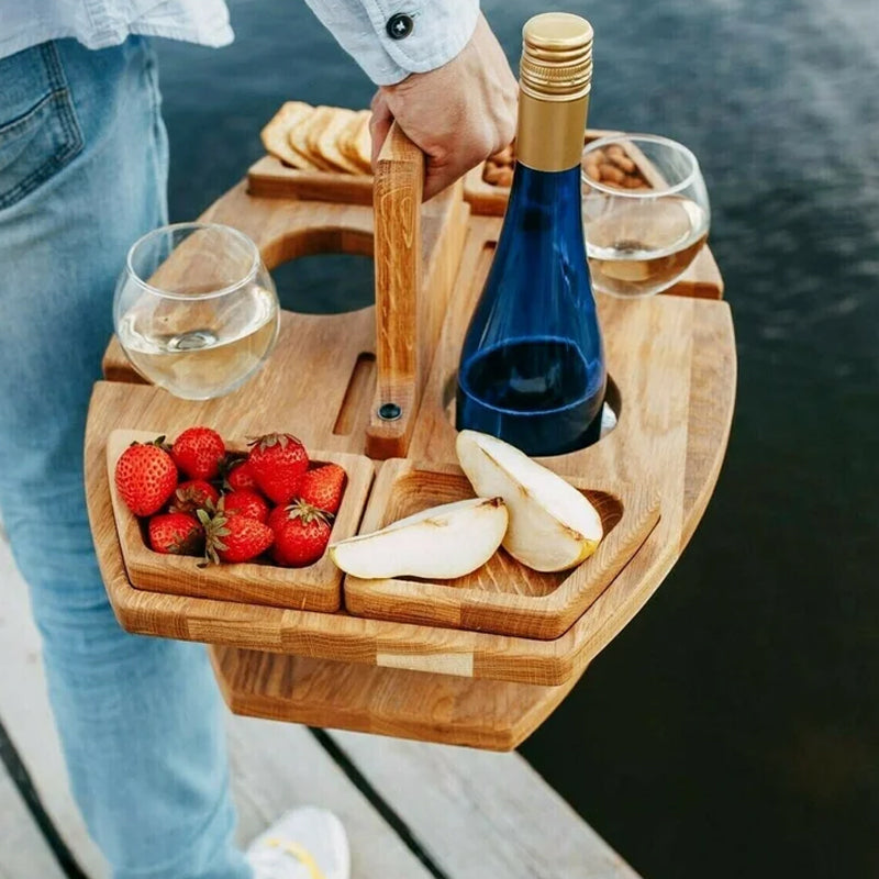 https://cdn.shopify.com/s/files/1/0694/5698/6201/files/WineNest___Folding_Picnic_Table__Portable_Wooden_Design_with_Glass_Holders_3.jpg