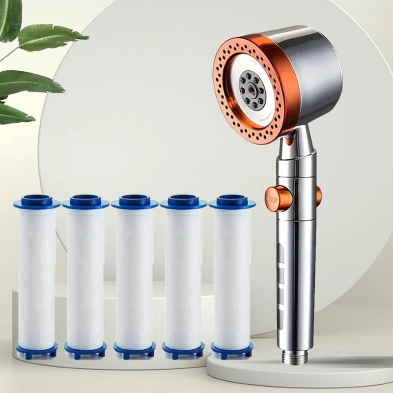 Water filter system with a handheld showerhead and replacement filters on a white background.
