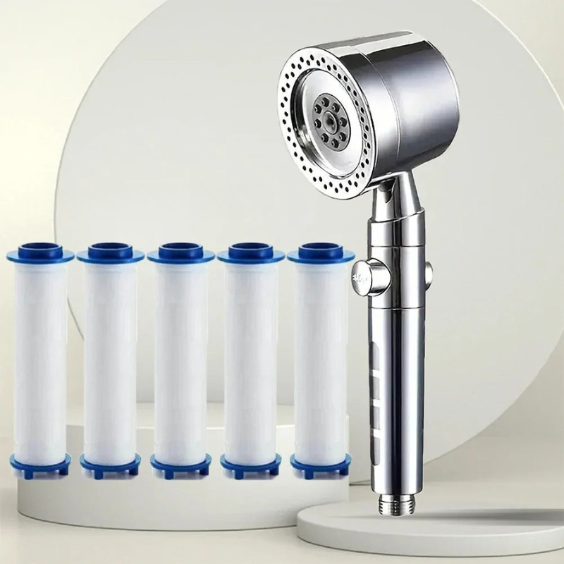 Chrome water filter faucet with six white filter cartridges on a light gray background