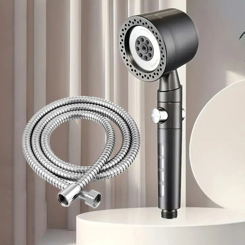 Handheld shower head with flexible hose on a neutral background
