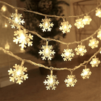 String of snowflake lights on a blurred background