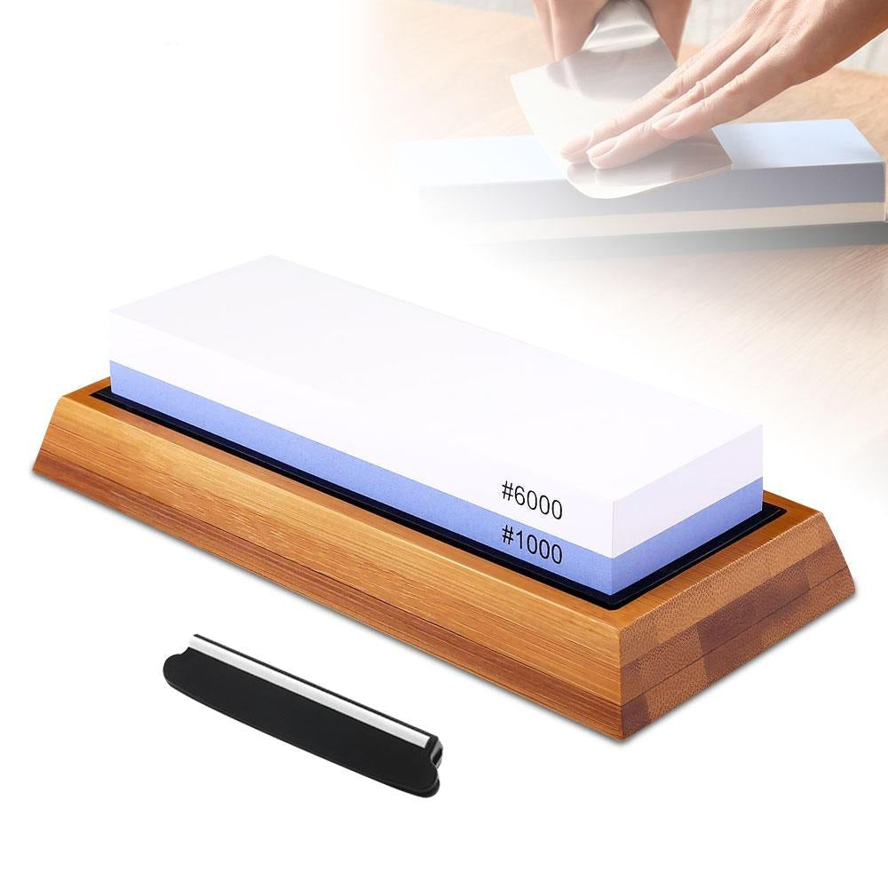 Knife sharpening stone with two grit levels on a wooden base, with a honing steel next to it.