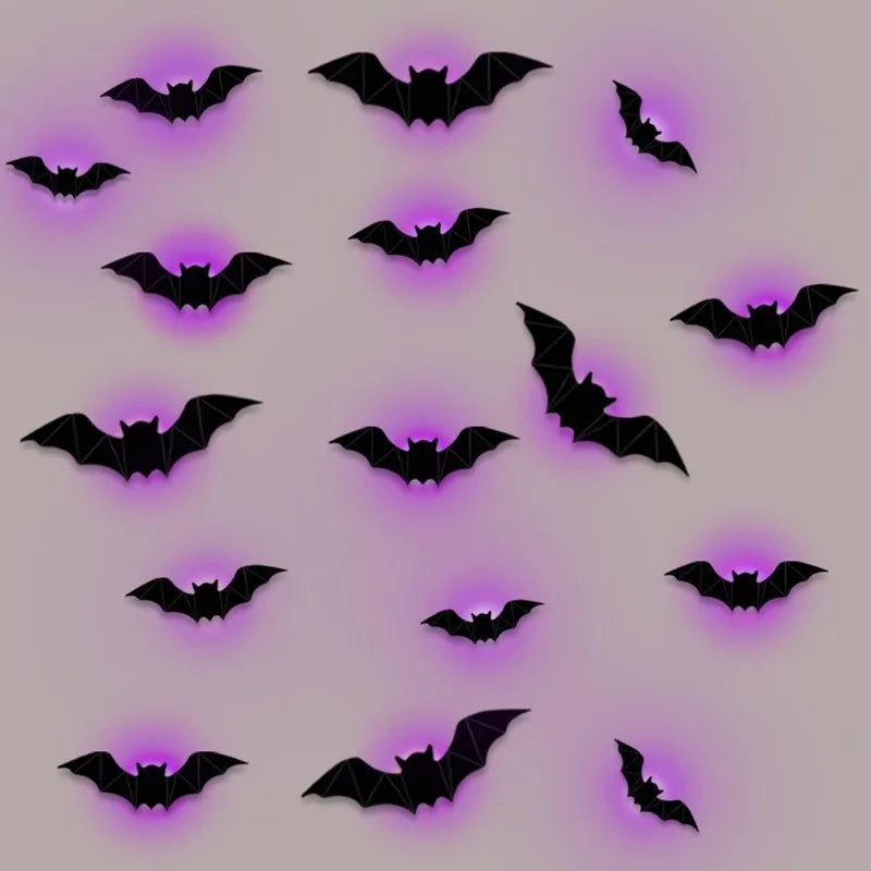 Black bat-shaped decorations with purple glowing centers on a light gray background