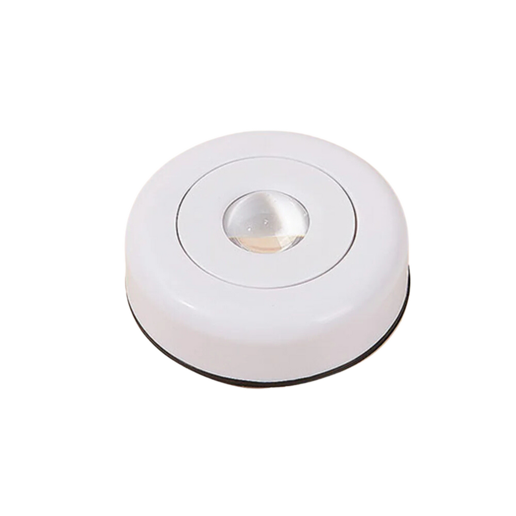 White round night light on a white background