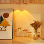 Decorative setup with jars and a vase on a shelf against a wall with abstract art.