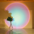 Vase with flowers on a reflective surface with colorful circular light projection